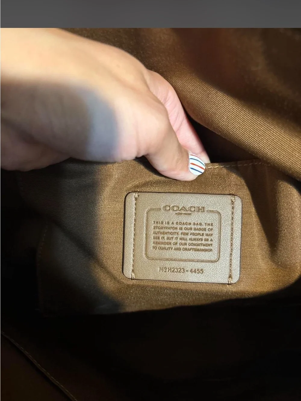Coach NWT Signature Canvas Zip Top Tote Bag in the color Khaki/Saddle